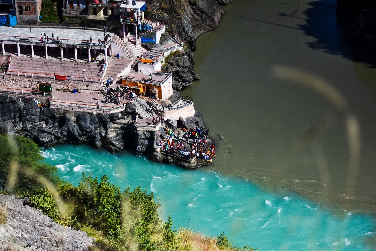 Aerial view of river confluence and structures at Devprayag, Uttarakhand.